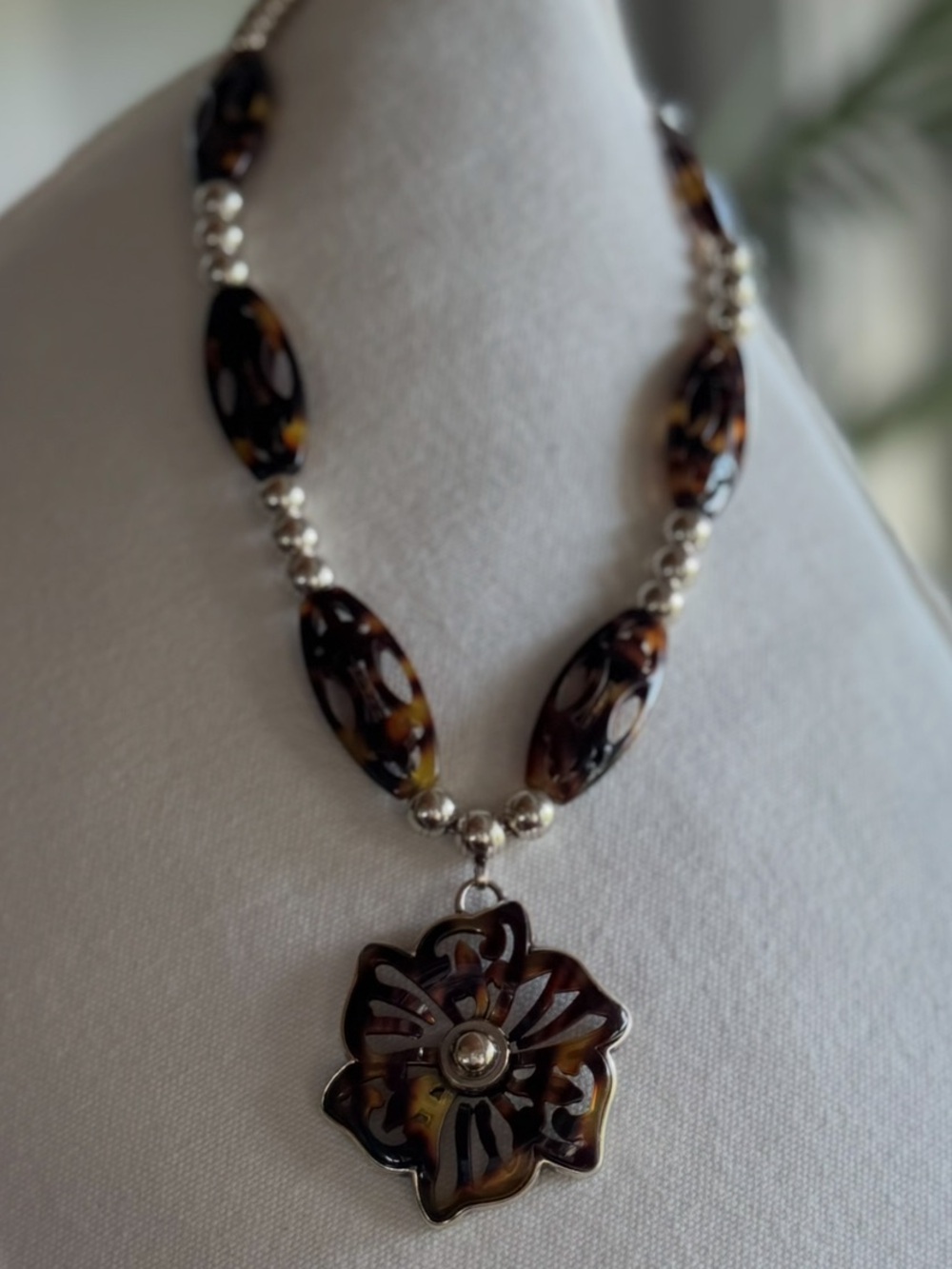 Brighton Shadow Garden tortoise flower necklace